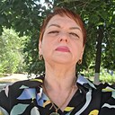 Еагения, 52 года