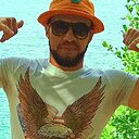 Иззат Комай, 33 года