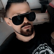Фотография мужчины Ovy, 32 года из г. Curtea De Argeș